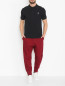 Трикотажные брюки с карманами Adidas Originals  –  МодельОбщийВид
