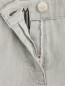 Джинсы с вышивкой и молниями на манжетах Moschino  –  Деталь