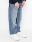 Прямые джинсы с принтом Moschino  –  МодельВерхНиз