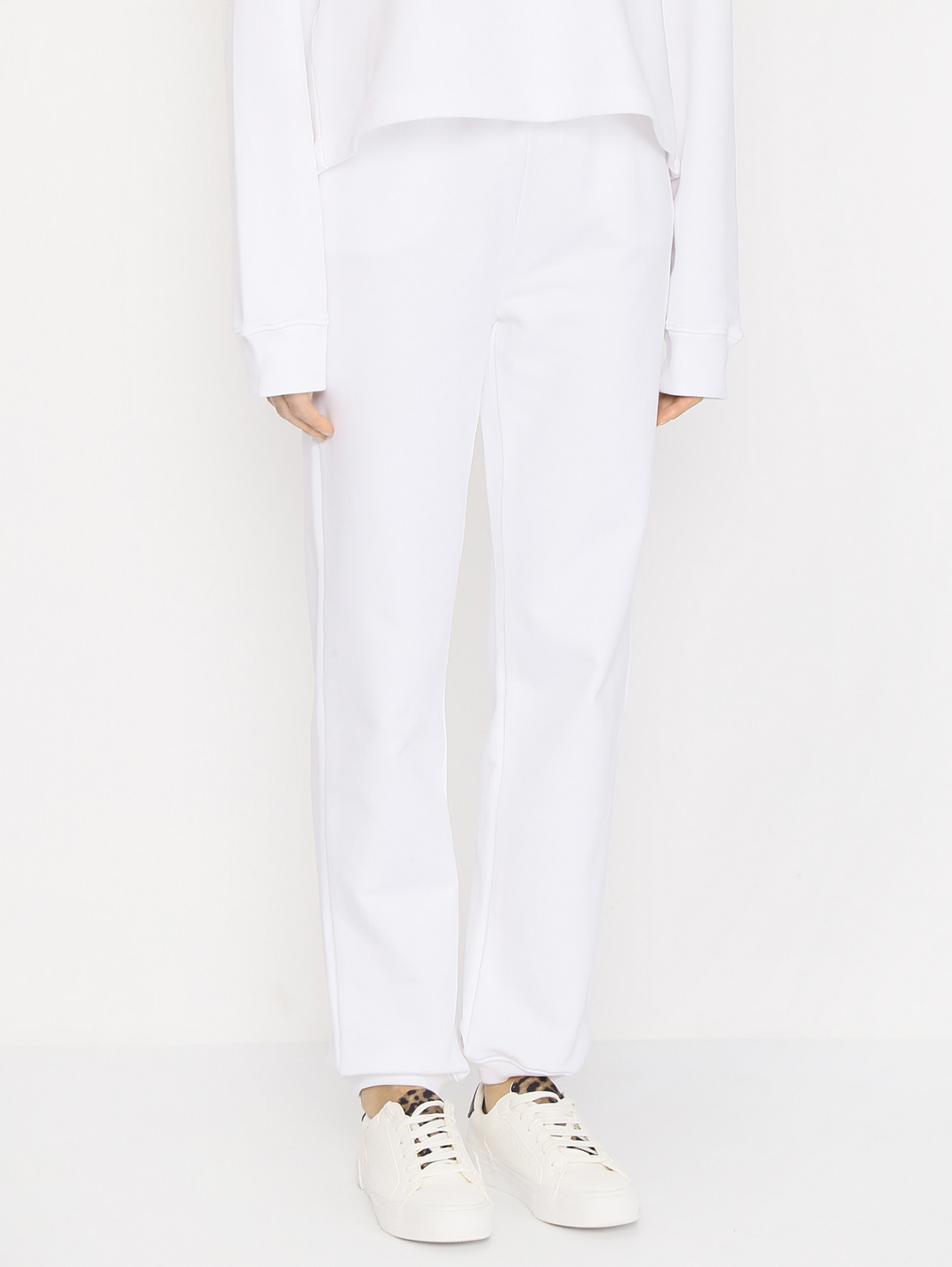 Трикотажные брюки с принтом Moschino  –  МодельВерхНиз  – Цвет:  Белый