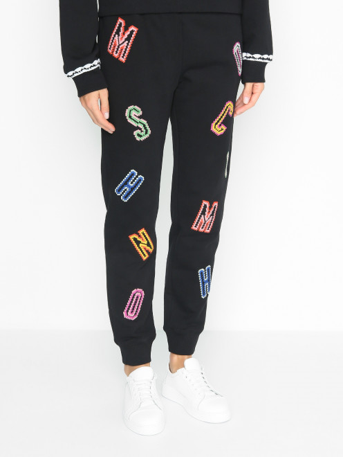 Трикотажные брюки с карманами Moschino - МодельВерхНиз