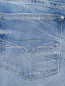 Узкие джинсы с "рваным эффектом" Guess Kids  –  Деталь1