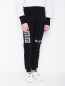 Трикотажные брюки с аппликацией Givenchy  –  МодельВерхНиз