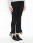 Укороченные джинсы с декоративной шнуровкой Mo&Co  –  МодельВерхНиз