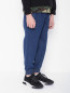 Джинсовые брюки на резинке Dolce & Gabbana  –  МодельВерхНиз
