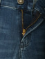 Зауженные джинсы с разрезами Diesel  –  Деталь