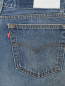 Укороченные джинсы из светлого денима Re/Done  –  Деталь
