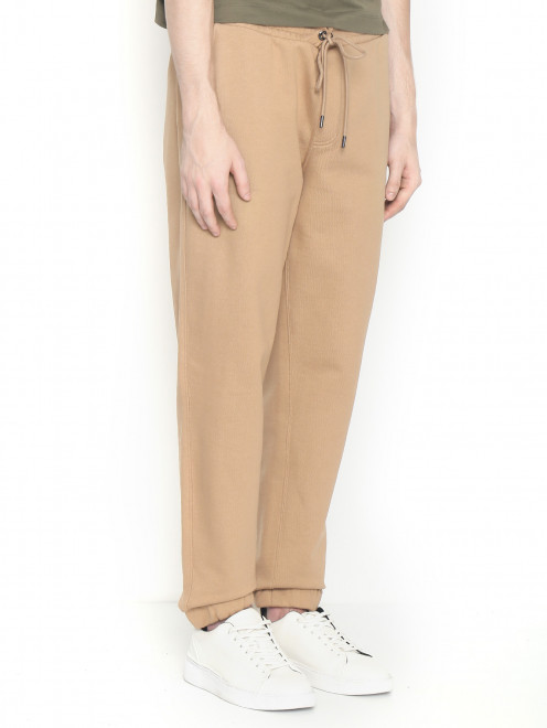 Трикотажные брюки на резинке с логотипом - МодельВерхНиз