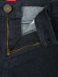 Расклешенные джинсы из темного денима Marina Sport  –  Деталь