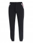 Трикотажные брюки из хлопка с контрастной отделкой Moschino Underwear  –  Общий вид