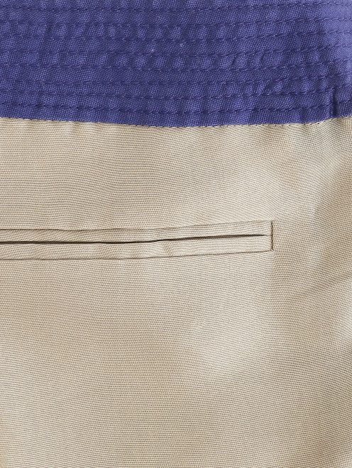 Укороченные брюки из шелка - Деталь