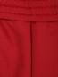 Спортивные брюки на резинке с контрастными лампасами Moncler  –  Деталь1