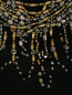 Платье из шерсти декорированное камнями и бусинами Moschino  –  Деталь