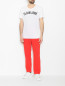 Трикотажные брюки с логотипом Adidas Originals  –  МодельОбщийВид