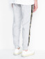 Трикотажные брюки из хлопка на резинке Moschino Underwear  –  МодельВерхНиз1
