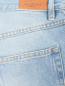 Укороченные джинсы из светлого денима Isabel Marant  –  Деталь