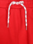 Спортивные брюки из хлопка с лампасами BOSCO  –  Деталь1