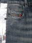 Узкие джинсы с метализированными лампасами Diesel  –  Деталь1