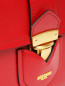 Сумка из кожи овальной формы на толстом ремешке Moschino Couture  –  Деталь