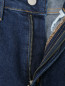 Узкие джинсы из темного денима Calvin Klein  –  Деталь1
