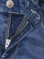 Узкие джинсы с надрезами Guess  –  Деталь