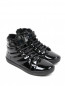 Ботинки из лаковой кожи с меховой отделкой Dolce & Gabbana  –  Общий вид