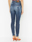 Зауженные джинсы с принтом Guess  –  МодельВерхНиз1