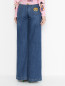 Расклешенные джинсы с карманами Moschino  –  МодельВерхНиз1