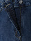 Расклешенные джинсы с карманами Moschino  –  Деталь