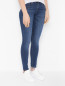 Зауженные джинсы с карманами Guess  –  МодельВерхНиз