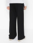 Трикотажные брюки со стрелками Moschino Kid  –  МодельВерхНиз1