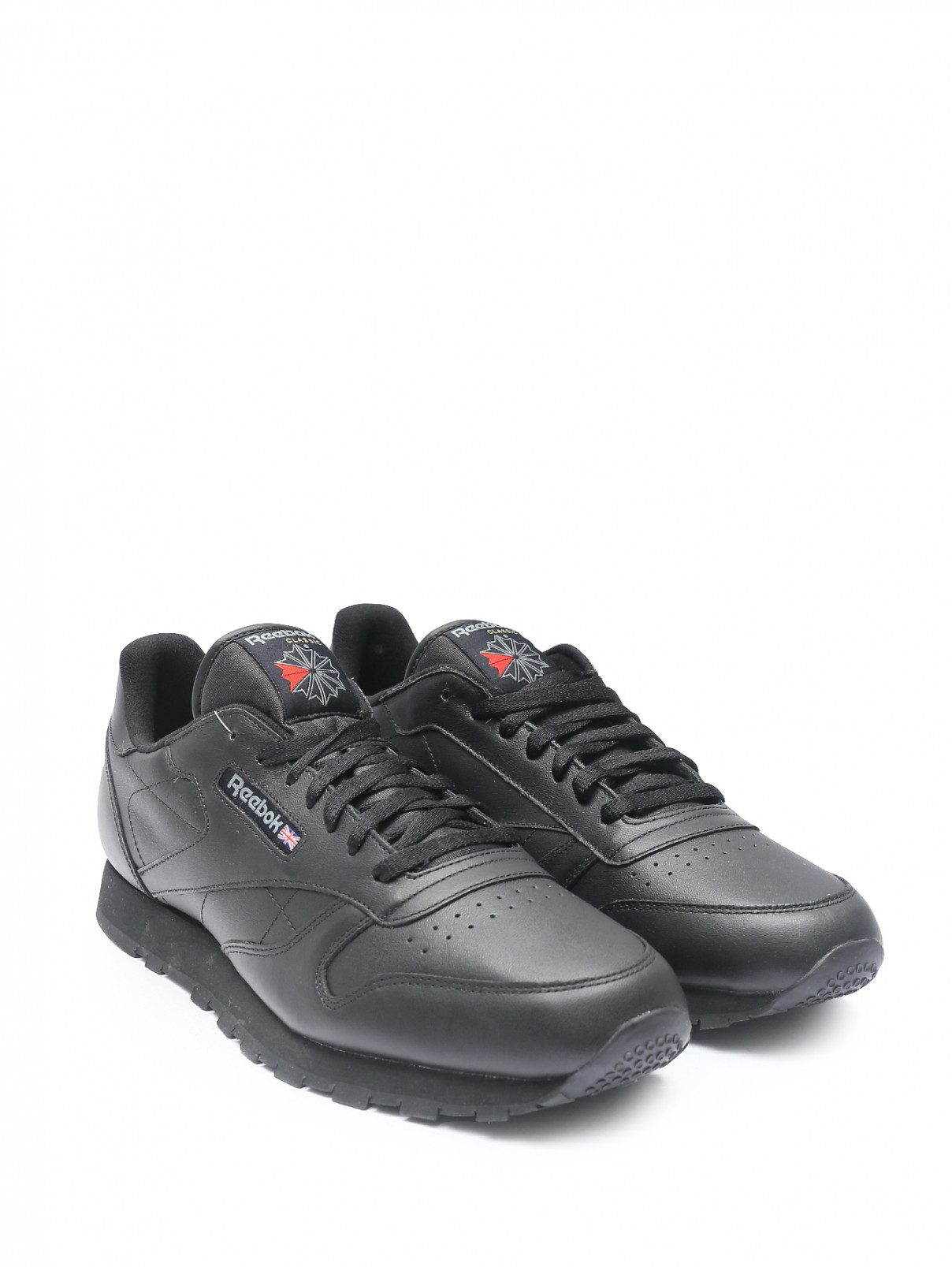 Однотонные кроссовки на шнурках Reebok Classic  –  Общий вид