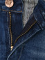 Узкие джинсы с эффектом потертости и рваности Diesel  –  Деталь1