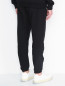 Трикотажные брюки из хлопка с контрастной отделкой Moschino Underwear  –  МодельВерхНиз1