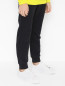 Трикотажные брюки с принтом Givenchy  –  МодельВерхНиз