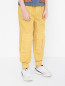 Хлопковые брюки с накладными карманами Stella McCartney kids  –  МодельВерхНиз