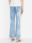 Расклешенные джинсы из хлопка Ganni  –  МодельВерхНиз1