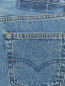 Джинсы с потертостями декорированные искусственным жемчугом Forte Dei Marmi Couture  –  Деталь