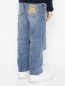 Прямые джинсы с принтом Moschino  –  МодельВерхНиз1