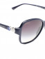 Солнцезащитные очки "стрекоза" с кристаллами на дужках BVLGARI  –  Деталь