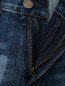 Прямые джинсы с подворотами N21  –  Деталь