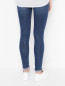 Зауженные джинсы с карманами Guess  –  МодельВерхНиз1