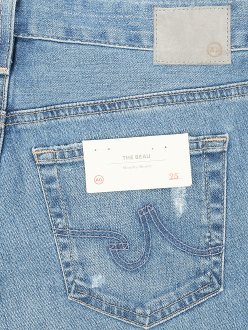 Укороченные джинсы прямого кроя с потертостями - Деталь
