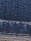 Зауженные джинсы с принтом Love Moschino  –  Деталь2