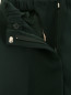 Узкие брюки на резинке N21  –  Деталь