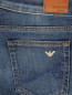 Узкие джинсы из потертого денима Emporio Armani  –  Деталь