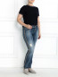 Узкие джинсы из потертого денима, декорированные кристаллами Marina Sport  –  Модель Общий вид